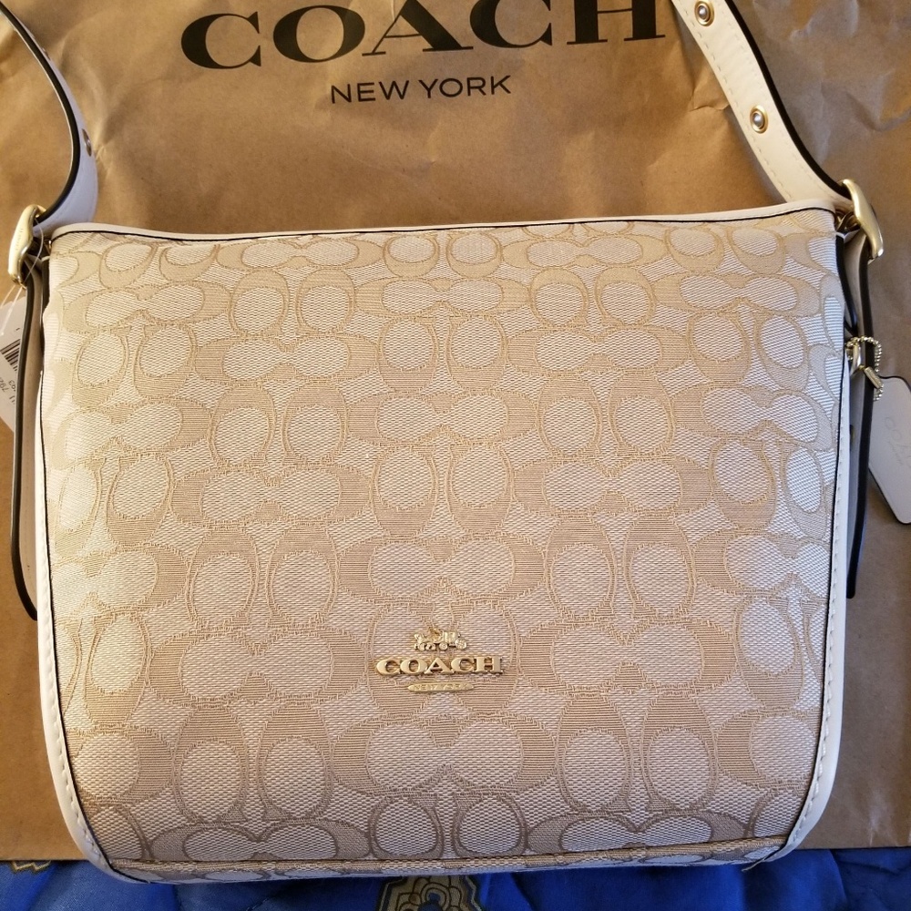 ISO matching wallet, wristlet and makeup bag in th